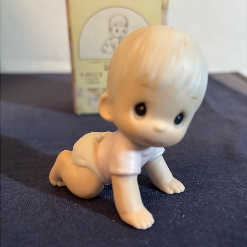 Precious moments baby crawling